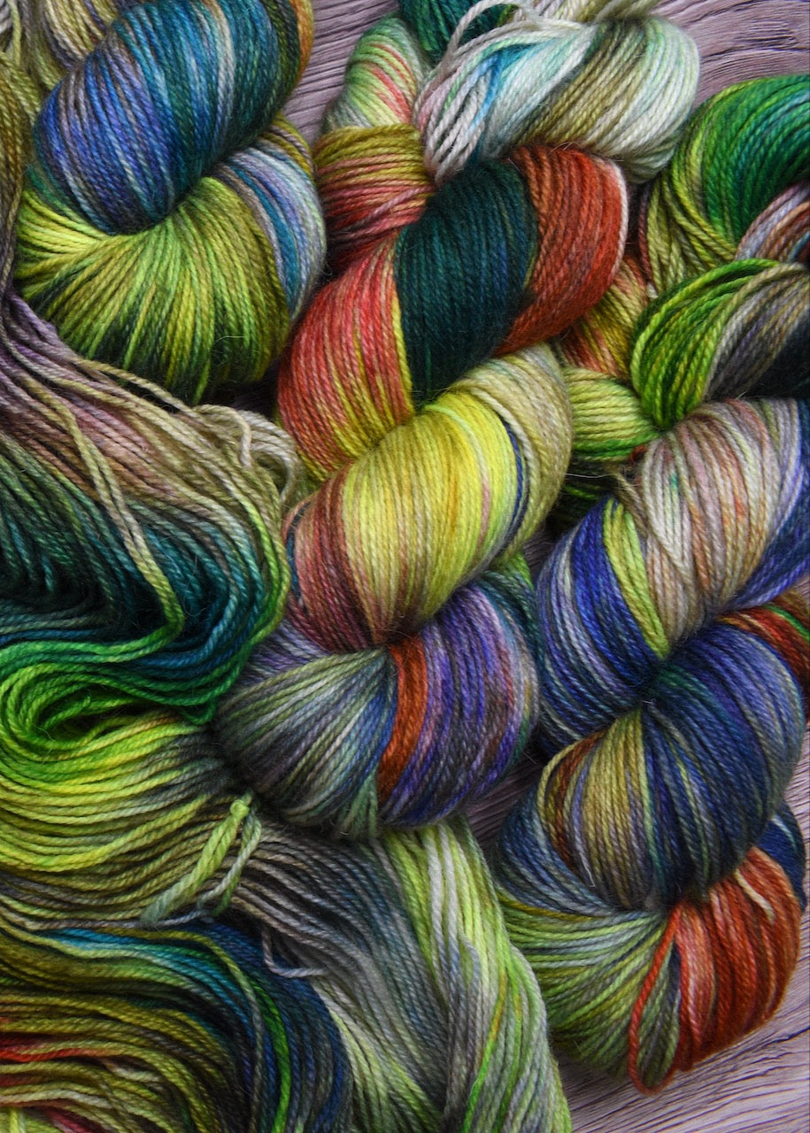 Green red blue wool sock yarn hand dyed.