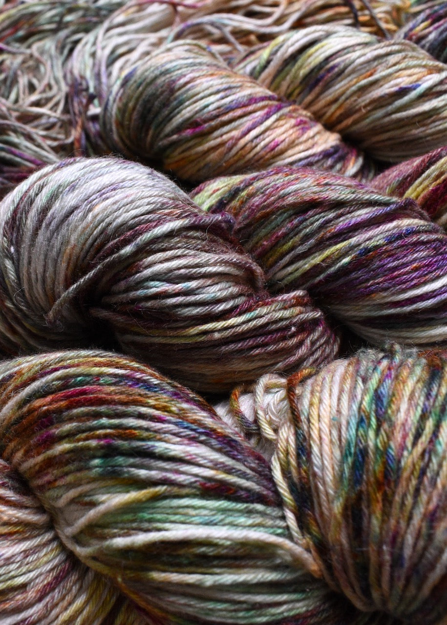 Multi colour speckled hand dyed dk weight yarn.