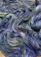 Blue speckled Dk weight hand dyed yarn.