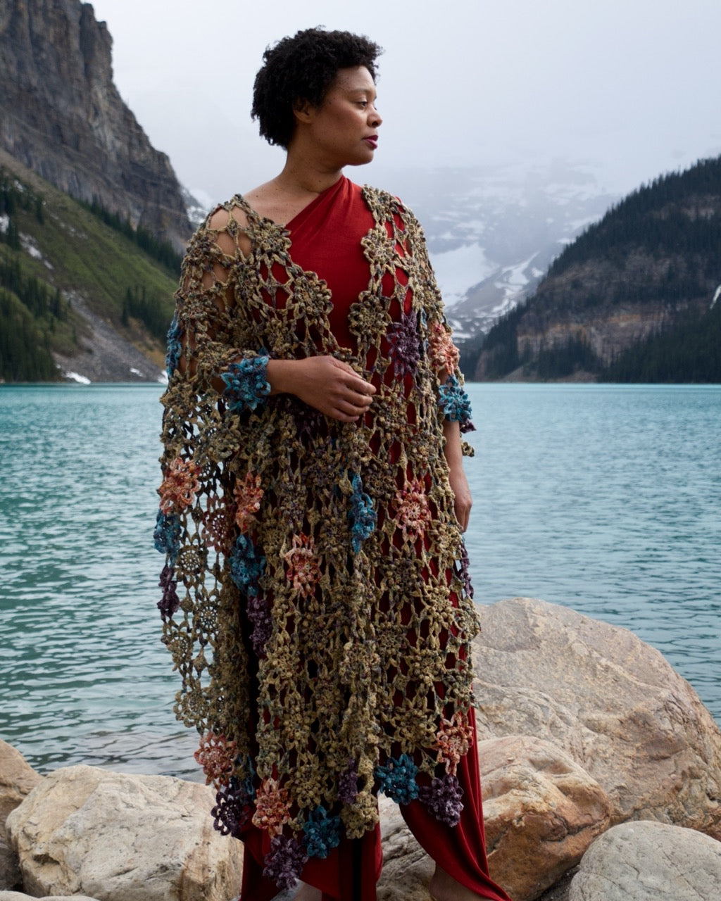 Crochet shawl pattern with motifs using hand dyed yarn.