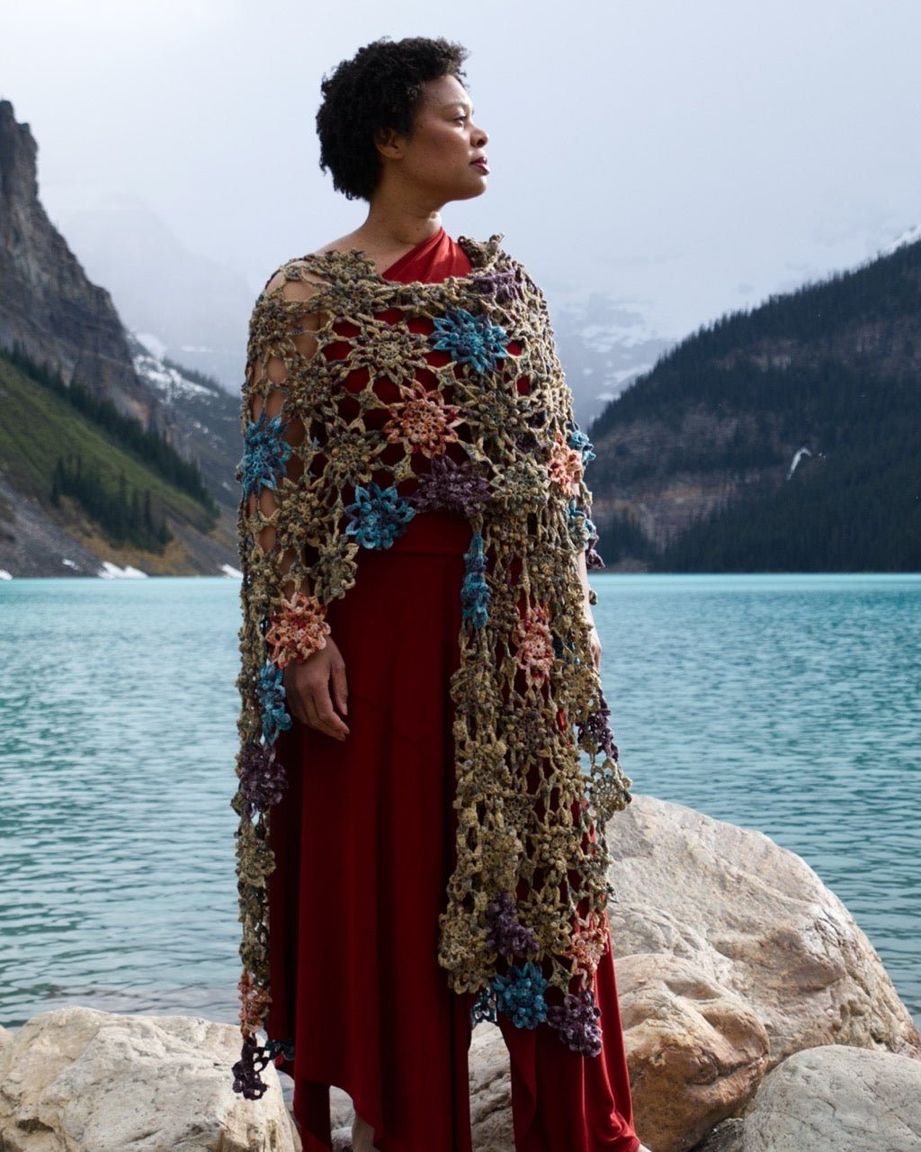 Crochet shawl pattern with motifs using hand dyed yarn.