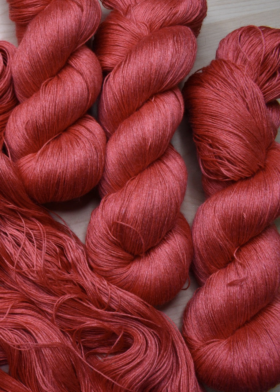 Red lace yarn hand dyed alpaca and tencel blend.