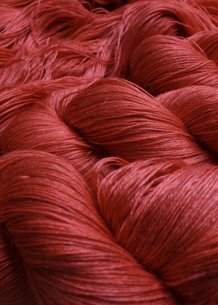 Red lace yarn hand dyed alpaca and tencel blend.