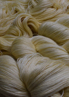 Creamy yellow alpaca lace yarn hand dyed.