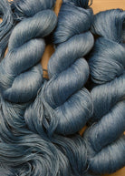 Blue alpaca and tencel hand dyed lace yarn.