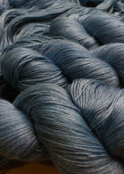 Blue alpaca and tencel hand dyed lace yarn.