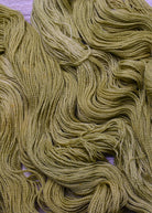 Soft yellow green wool yarn hand dyed.