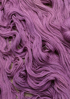 Pink wool hand dyed sock yarn.