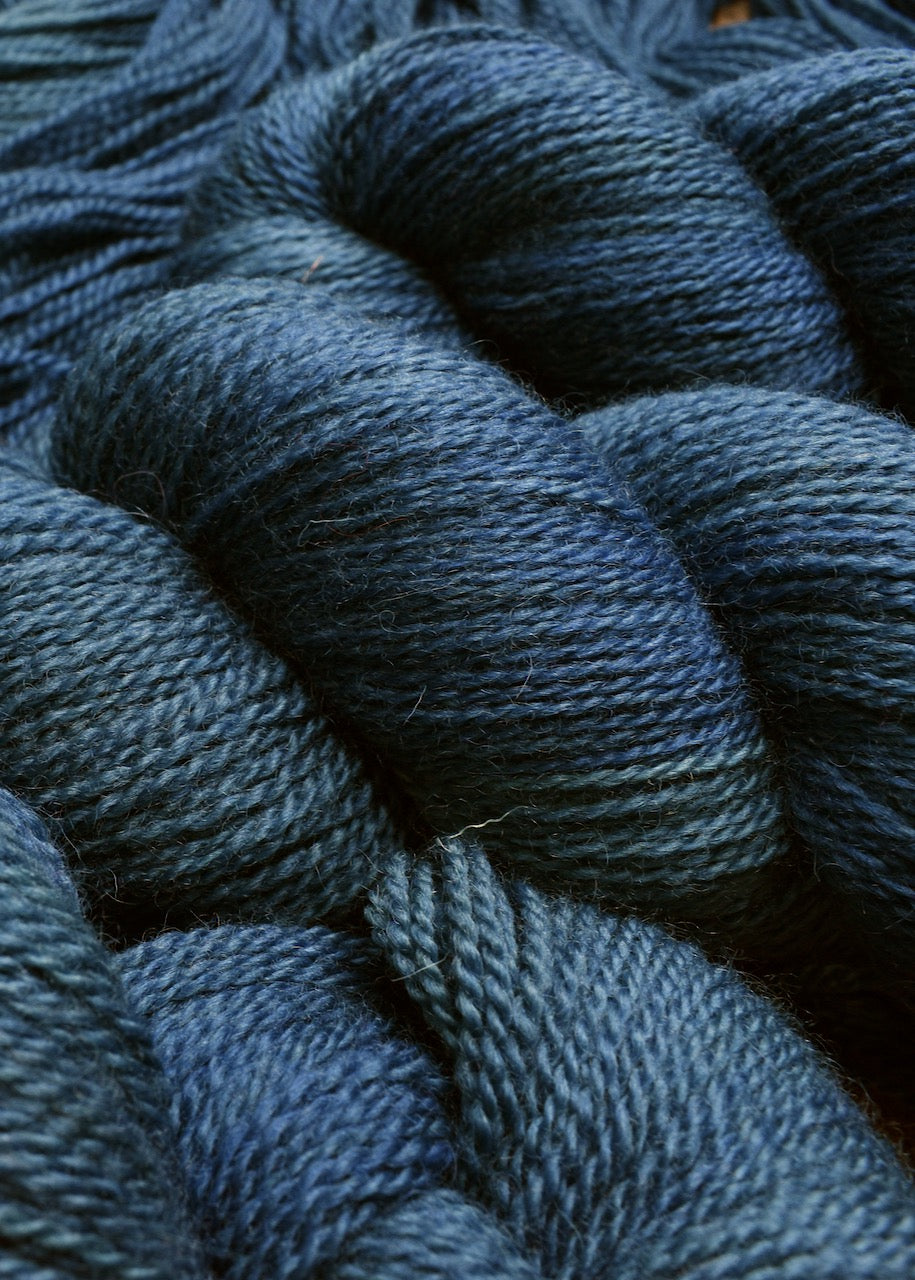 Teal blue hand dyed wool sock yarn.