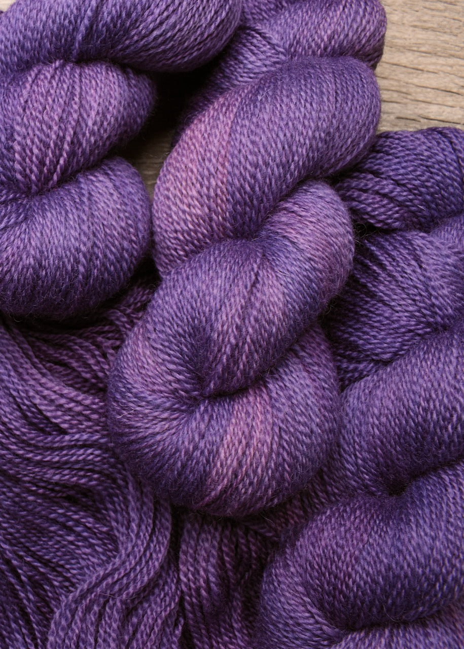 Lavender coloured hand dyed wool sock yarn.