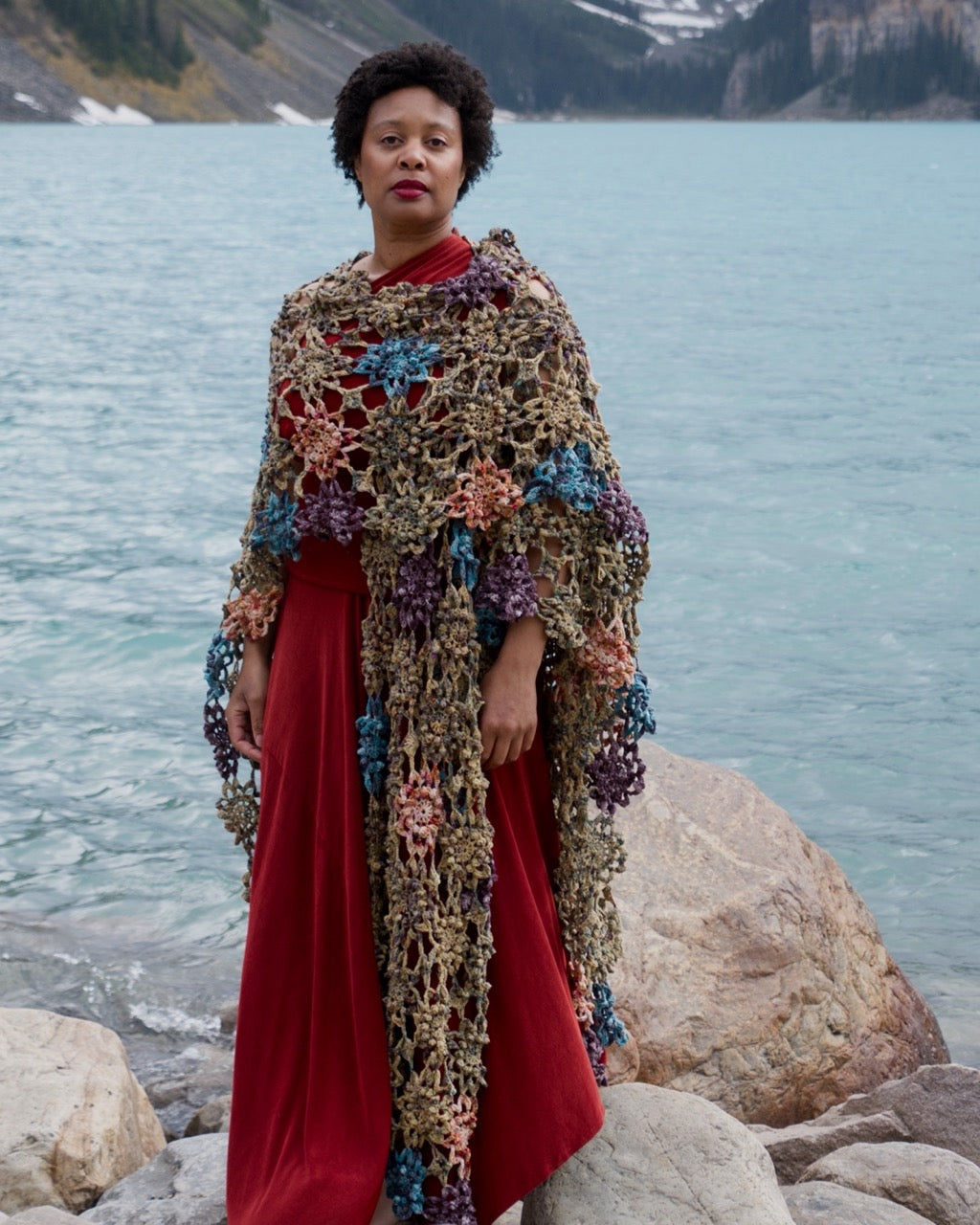 Crochet shawl pattern with motifs using hand dyed yarn.