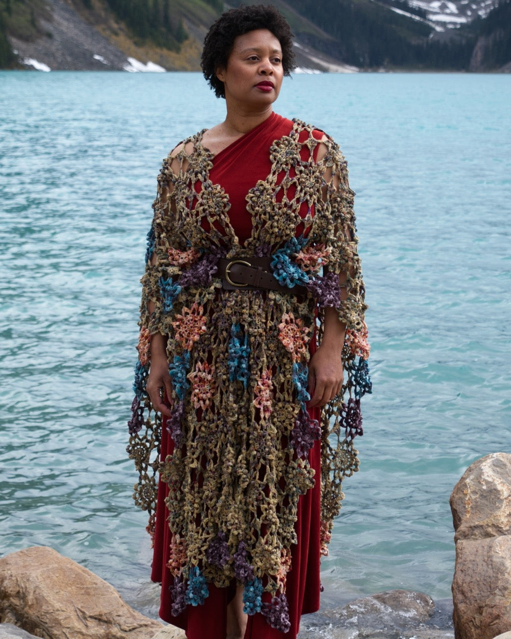 Crochet shawl pattern with motifs using hand dyed yarn.