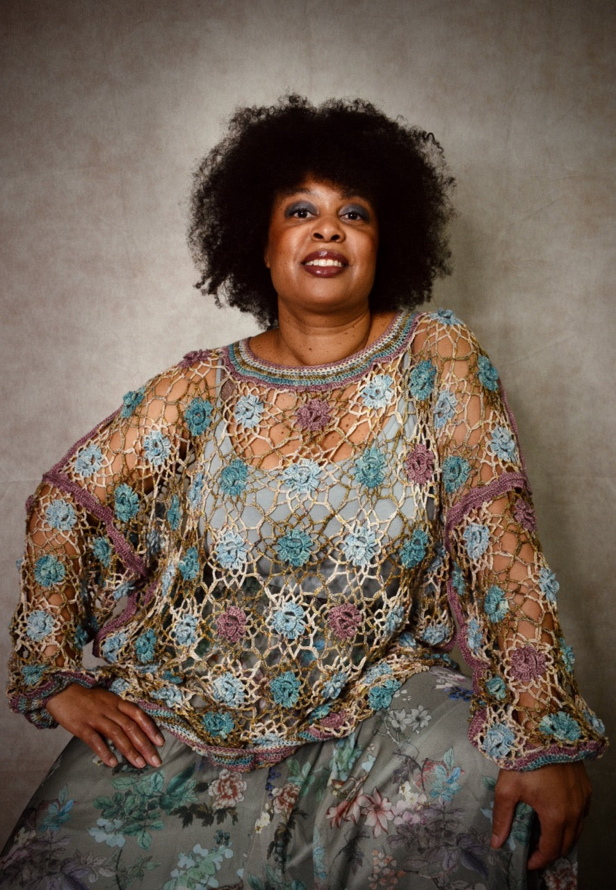 Crochet lace sweater pattern using hand dyed silk yarn.