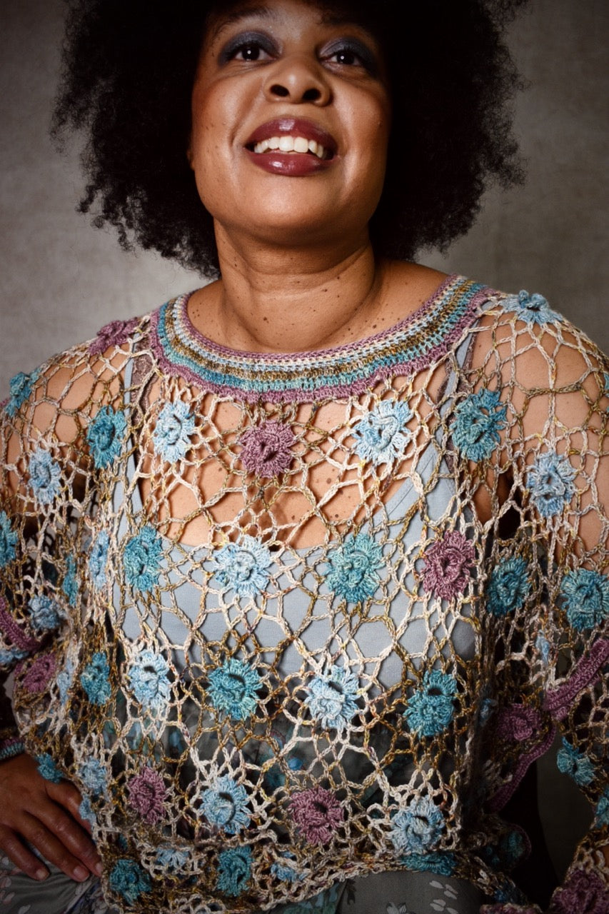 Crochet lace sweater pattern using hand dyed silk yarn.