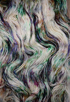 Multi colour speckles hand dyed on merino sport weight yarn.