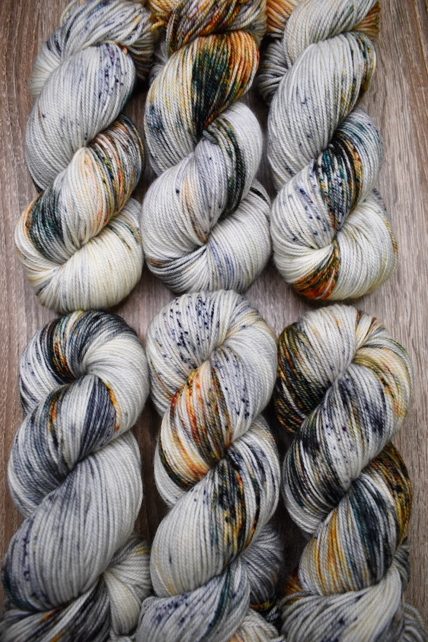 Speckled hand dyed merino yarn.