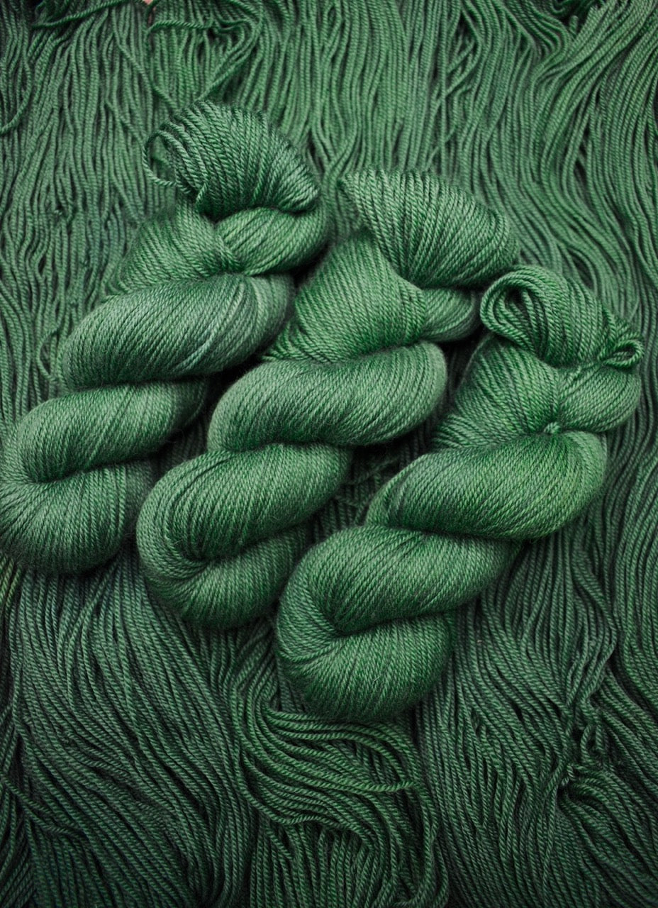 100% wool yarn hand dyed green.