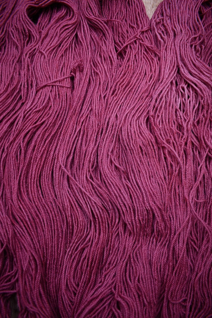 Pink wool yarn hand dyed.