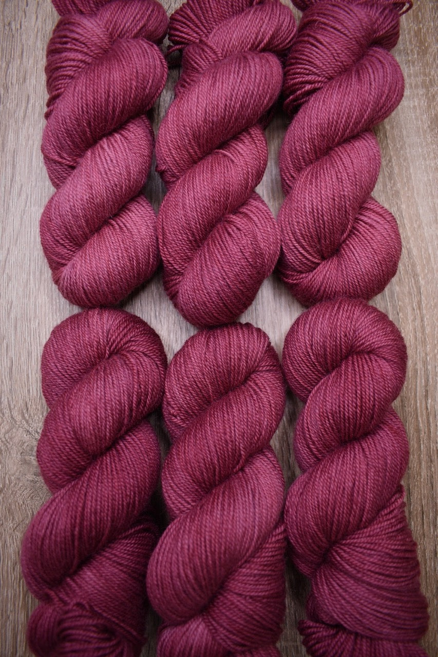 Pink wool yarn hand dyed.