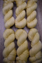 Hand dyed wool yarn, light yellow.