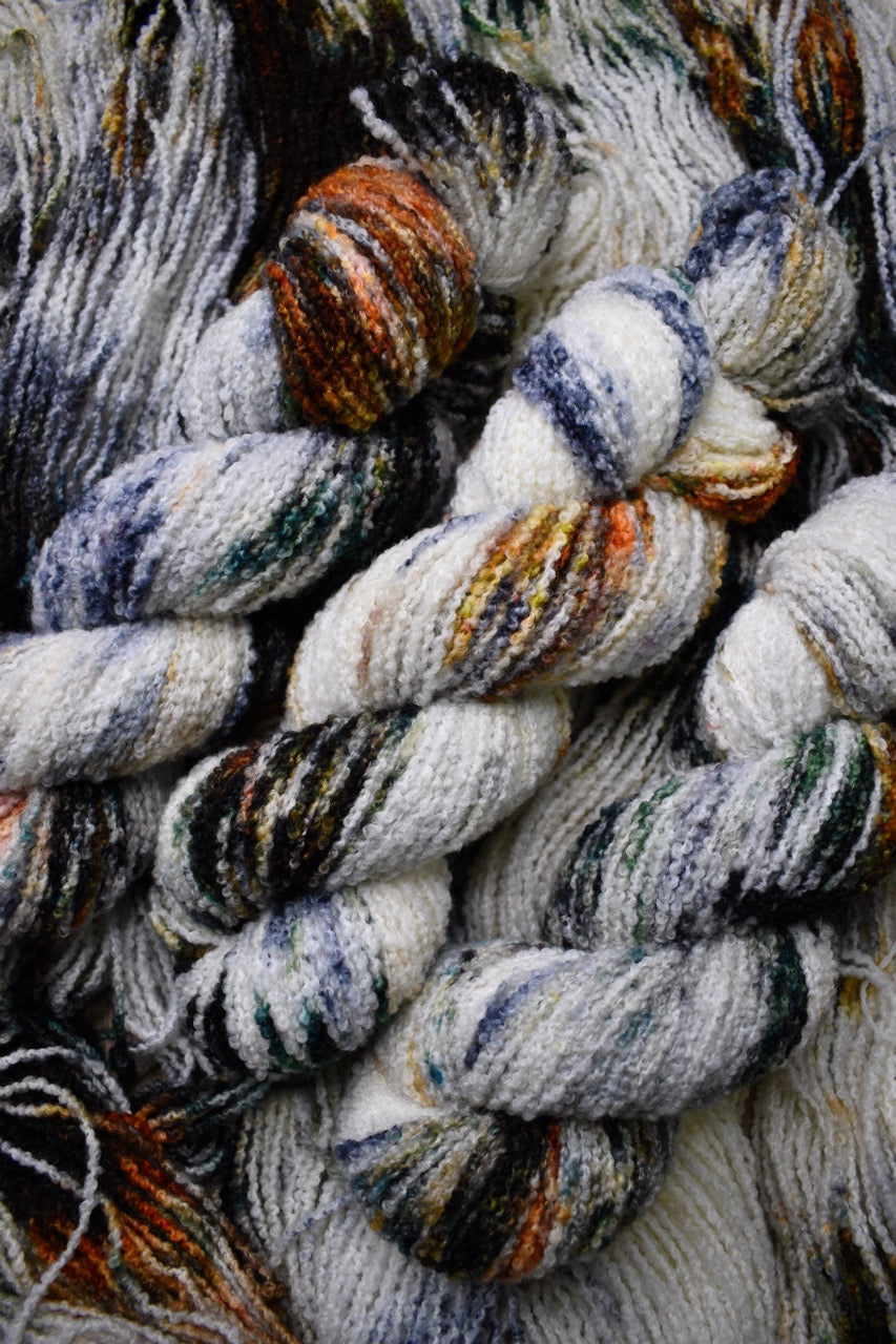 Hand dyed merino yarn, boucle texture, colour Koi Pond.