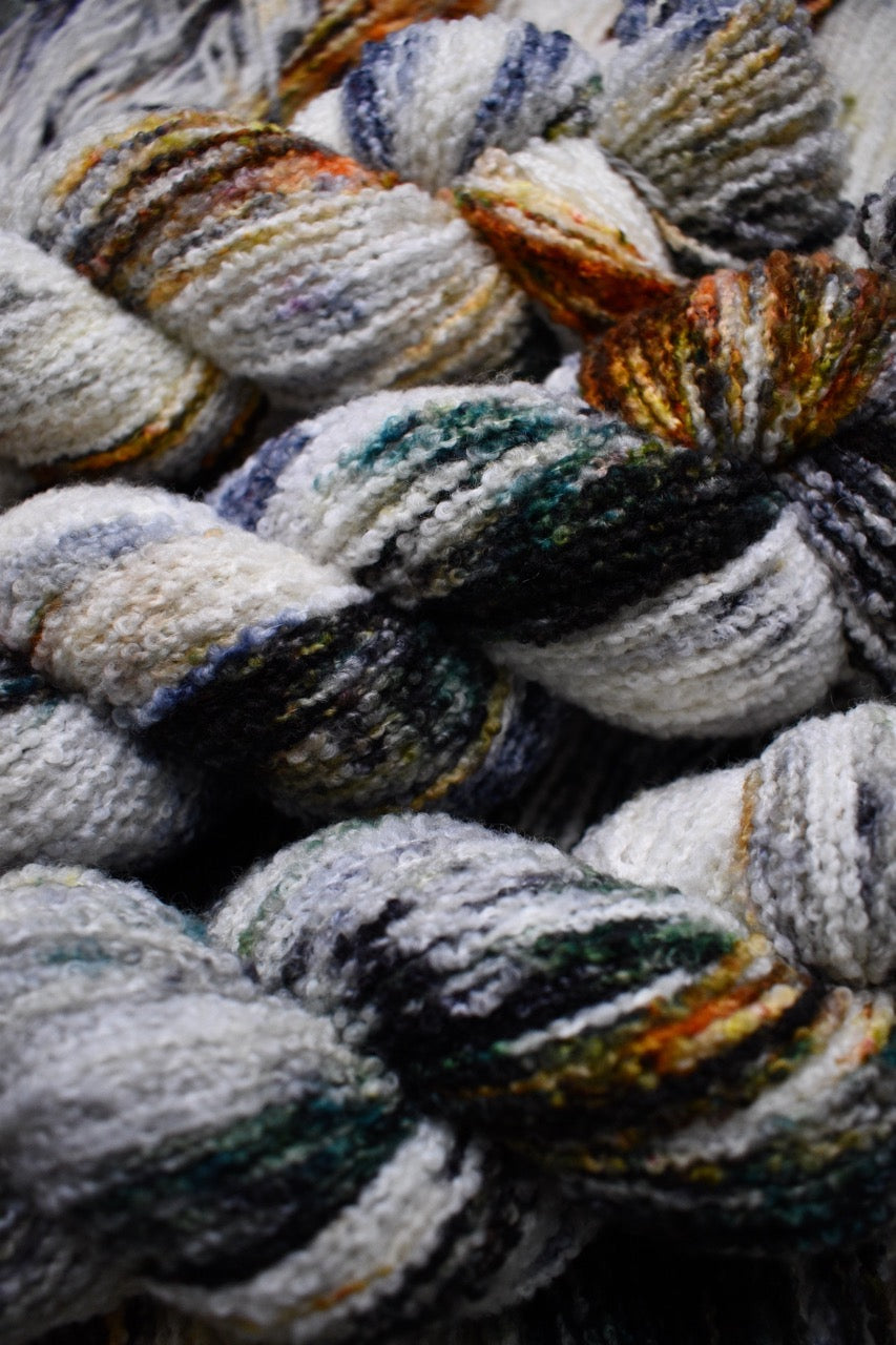 Hand dyed merino yarn, boucle texture, colour Koi Pond.