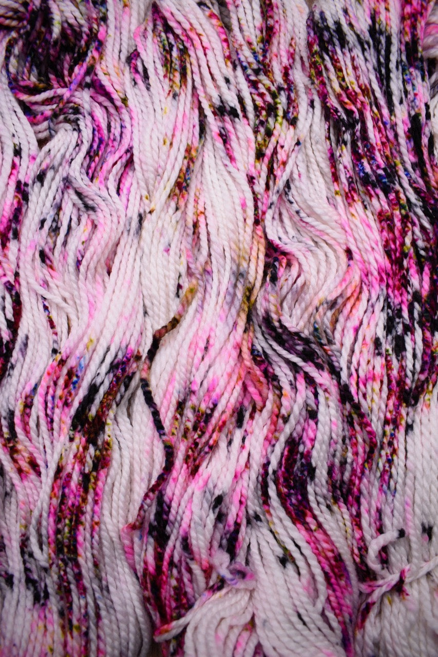 Speckled pink multi colour hand dyed merino bulky yarn.