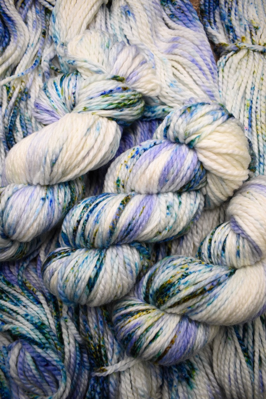Blue speckled hand dyed merino bulky yarn.