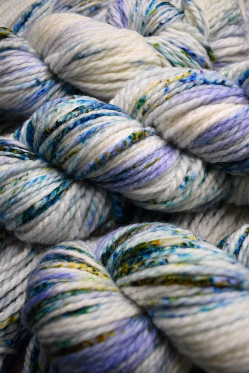 Blue speckled hand dyed merino bulky yarn.