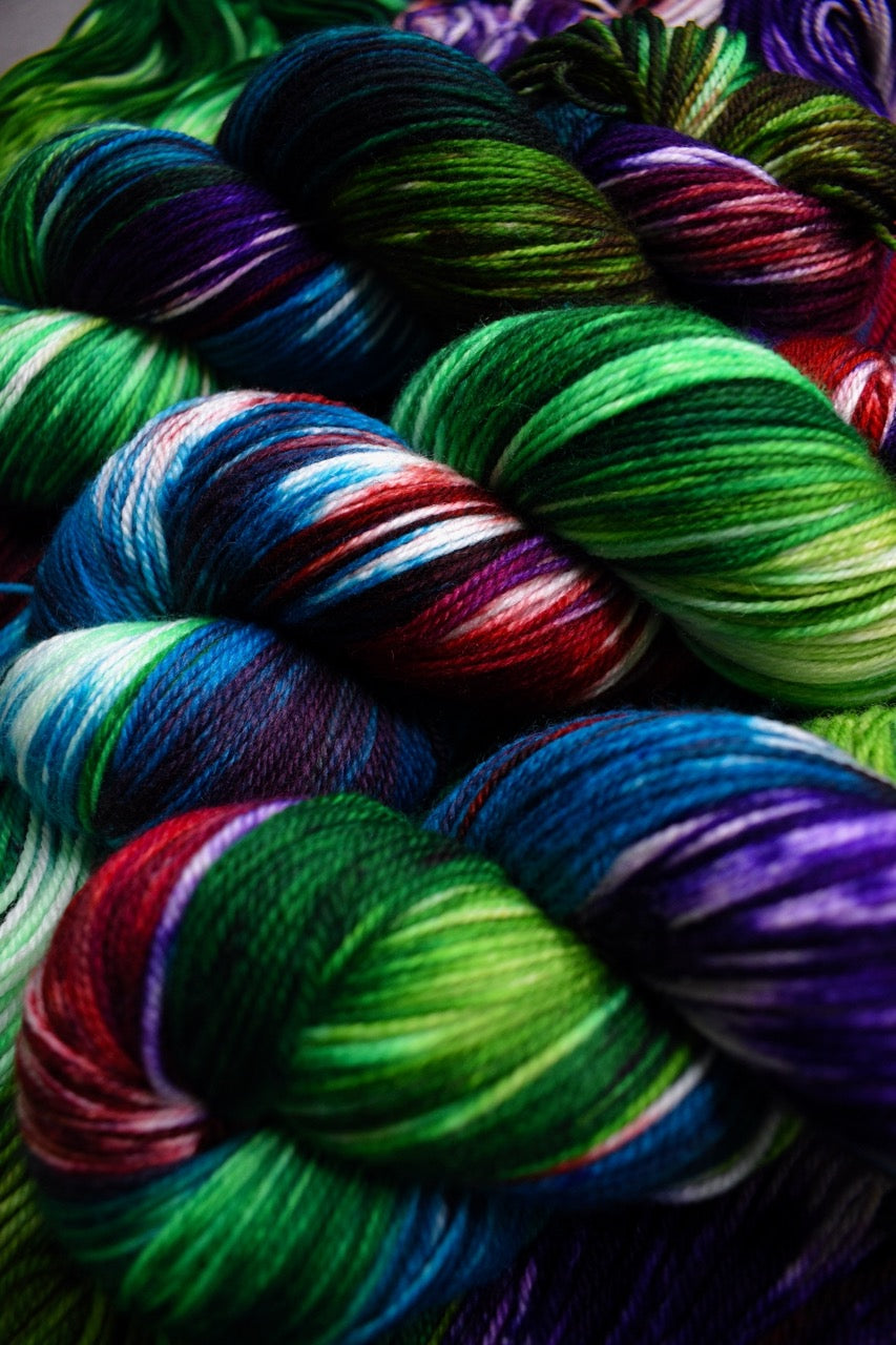 Green blue red merino sock yarn hand dyed.