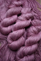 Pink hand dyed silk linen yarn.