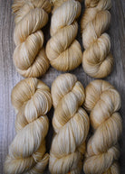 Cream yellow merino yarn hand dyed.