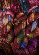 Pink green and brown hand dyed wool sock yarn.