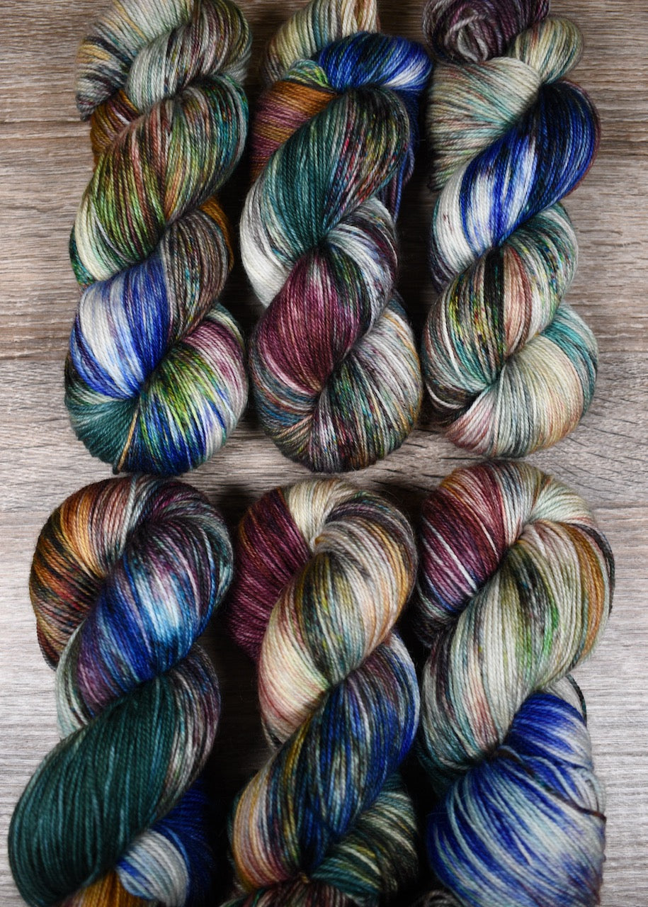 A variety of colour speckles on hand dyed bfl wool sock yarn.