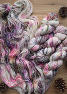 Hand dyed merino cashmere silk yarn pink and multi colour speckles.